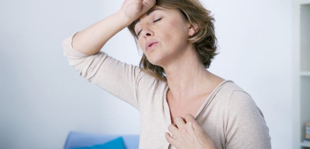 Woman suffering through menopause