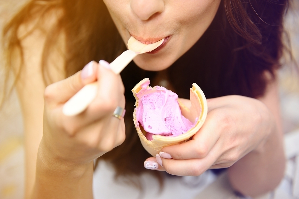 Closeup of woman having ice cream