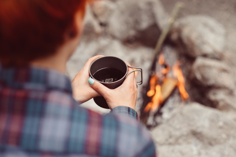 Woman drinking hot coffee 